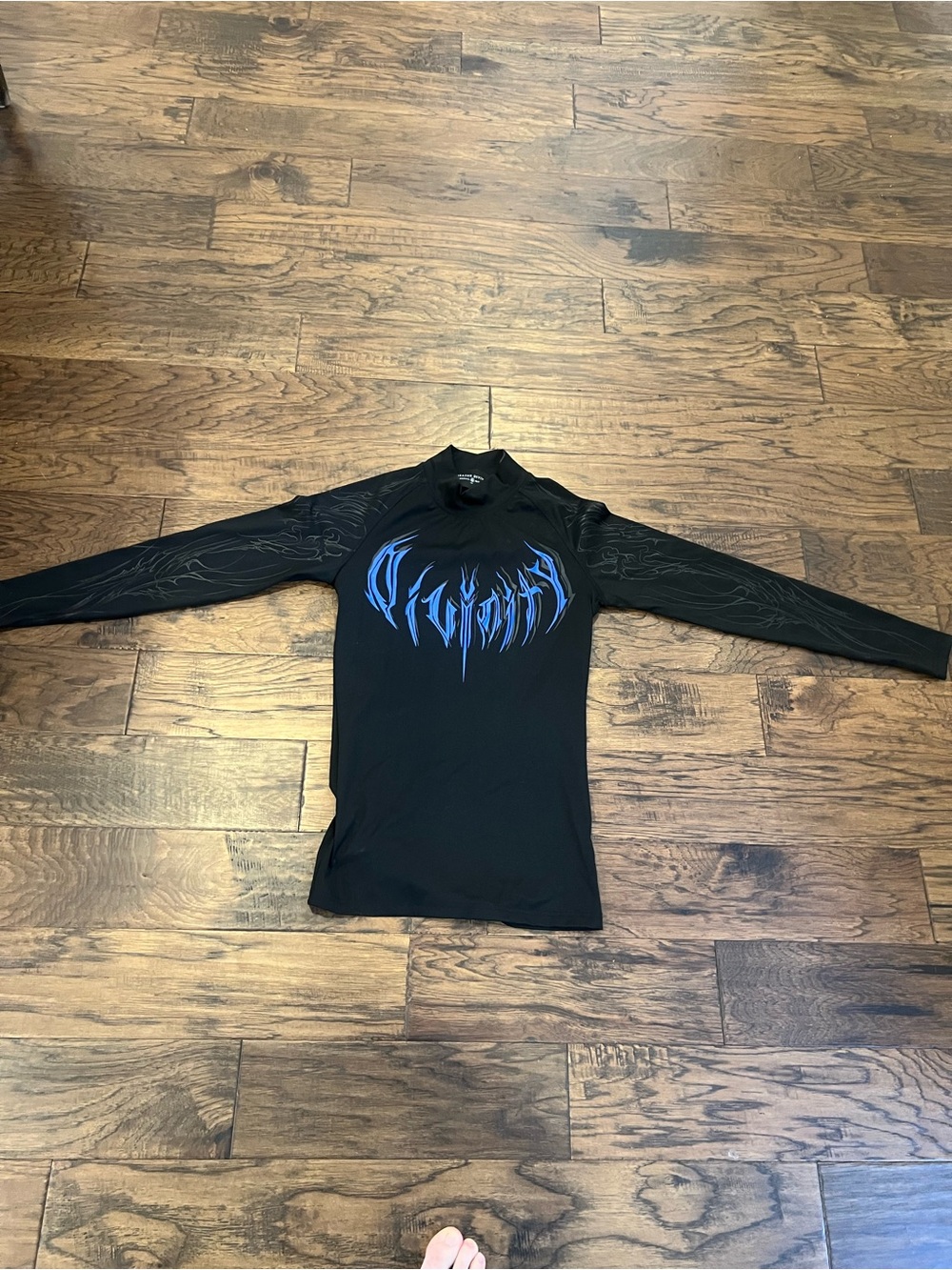 Black Long Sleeve Performance Top with Blue Graphic Chest